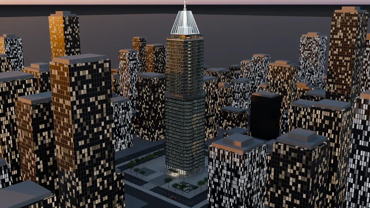 Aerial view of the tower above a lit city