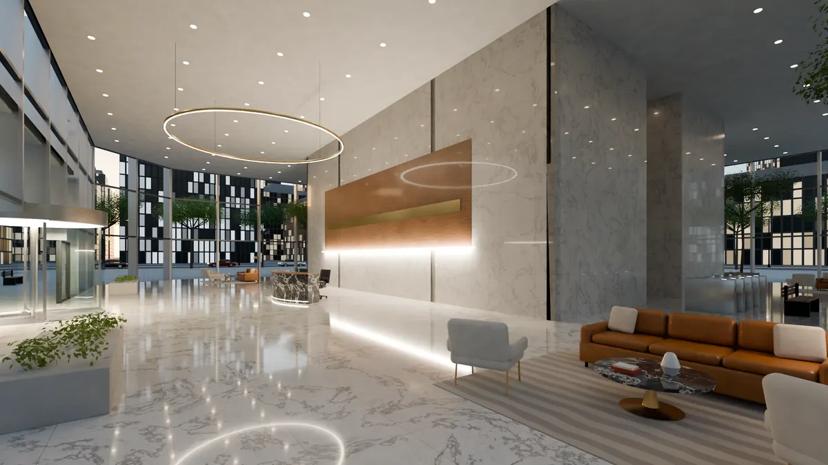 Tower lobby with marble floor and ring lights
